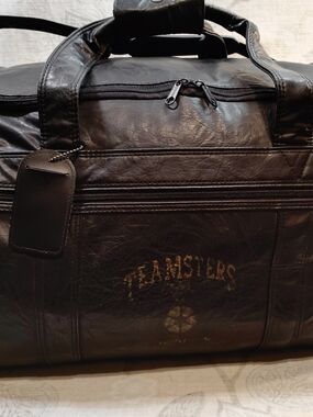 Black Leather Duffel Bag With Teamster Logo Lightly Printed